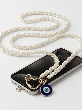 SOLD Pearl Handcrafted Beaded Phone Crossbody with Blue Evil Eye Charm